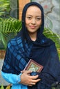 Muslim Woman Holding Qur'an