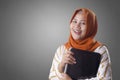 Muslim Woman Holds Laptop Royalty Free Stock Photo