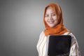 Muslim Woman Holds Laptop Royalty Free Stock Photo