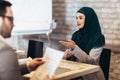 Muslim woman, job applicant having interview