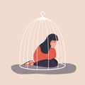 Muslim woman locked in cage. Sad teenager sitting on floor and crying. Social isolation concept. Female empowerment Royalty Free Stock Photo