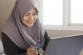 Muslim Woman Making Online Purchase Royalty Free Stock Photo