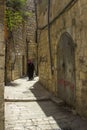 A Muslim woman in a narrow side street off the Via Dolorosa in Jerusalem