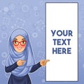 Muslim woman pointing finger to the left side at copy space Royalty Free Stock Photo