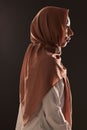 Muslim woman, profile and hijab in faith for religion, islam or praise against a dark studio background. Side view of Royalty Free Stock Photo
