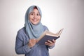 Muslim Woman Reading Book and Thinking Royalty Free Stock Photo