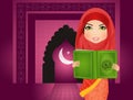 Muslim woman reading holy islamic book Coran Royalty Free Stock Photo