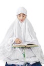 Muslim woman reads Kuran 2 Royalty Free Stock Photo