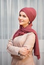 Muslim woman in a red scarf and closed clothes Royalty Free Stock Photo