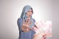 Muslim Woman Rejecting Bribery Money Royalty Free Stock Photo