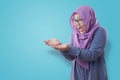 Muslim Woman Shows Copy Space Empty Palm Presenting Something