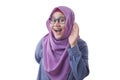 Muslim Woman Smiling While Doing Hearing Gesture Royalty Free Stock Photo