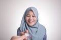 Muslim Woman Smiling When Receiving Credit Card Royalty Free Stock Photo