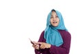 Muslim Woman Surprised to See Something Above when using Phone Royalty Free Stock Photo