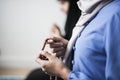 Muslim women using misbaha to keep track of counting in tasbih Royalty Free Stock Photo