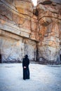 Muslim woman walking on the beach Royalty Free Stock Photo