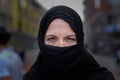 Muslim woman wearing a black hijab in town Royalty Free Stock Photo