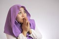 Muslim Woman Worried, Nervous and Looking Up to the Side