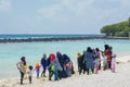 Muslim women and children during holidays at the beach