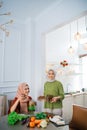 muslim woman serving drink for friend and family after fasting Royalty Free Stock Photo