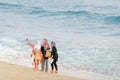 muslim women taking selfie on the beach