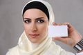 Muslim young woman with business card