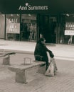 Muslima speaking on the phone outside Ann Summers Shop Royalty Free Stock Photo