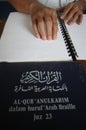 Muslims reading braille koran Quran Royalty Free Stock Photo