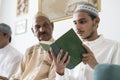 Muslims reading from the quran