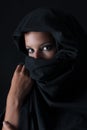 Muslin woman with black veil