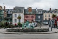 The mussel gatherers statue in center of medieval fishing village of Honfleur, Normandy, France