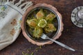 Mussel shaped special Turkish baklava with pistachio and turkish coffee