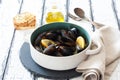 Mussels in cooper pot preparing with tymian and lemon Royalty Free Stock Photo