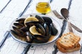Mussels on a plate preparing with tymian and lemon Royalty Free Stock Photo
