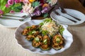 Mussels with feta cheese and spicy vegetables. Baked Mussels with Spicy Sauce. Garnished with Cherry Tomato and Salad Leaves. Spic Royalty Free Stock Photo