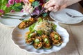 Mussels with feta cheese and spicy vegetables. Baked Mussels with Spicy Sauce. Garnished with Cherry Tomato and Salad Leaves. Spic Royalty Free Stock Photo