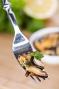 Mussels on a fork Royalty Free Stock Photo
