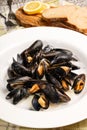 Mussels with garlic and butter sauce in a deep plate Royalty Free Stock Photo