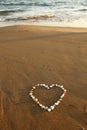 Mussels heart on beach Royalty Free Stock Photo