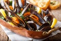 Mussels with lemon and garlic macro in a saucepan. horizontal Royalty Free Stock Photo