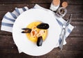 Mussels, rings of squids and a shrimp and a garnish from potatoe Royalty Free Stock Photo