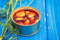 Mussels in small iron box on wooden background Royalty Free Stock Photo