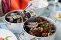 Mussels in spicy sauce, served in a pan, Athens, Greece Royalty Free Stock Photo