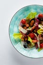 Mussels vongole in a plate with salad, mussels cooked in white wine sauce, seafood performed by the chef, close-up top Royalty Free Stock Photo