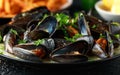 Mussels with white wine, garlic, lemon and herbs in a plate, French fries. rustick background. Seafood Royalty Free Stock Photo