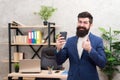 Must have stimulant for him. Man bearded manager businessman entrepreneur hold cup of coffee. Relaxed cheerful top Royalty Free Stock Photo