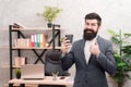 Must have stimulant for him. Man bearded manager businessman entrepreneur hold cup of coffee. Relaxed cheerful top Royalty Free Stock Photo