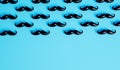 Mustache background. Lots of male mustaches on a blue background. 3D Rendering