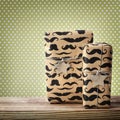 Mustache pattered gift boxes with star shaped tags