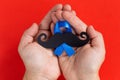 Mustache pattern with blue ribbon symbol. November movember concept. Royalty Free Stock Photo